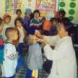 Shan Women's Action Network activist with children